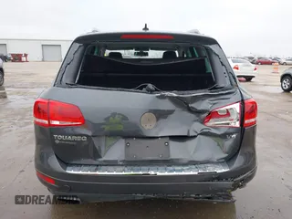 2012 Volkswagen Touareg Sport with VIN WVGEF9BP9CD008545, listed as a IAAI auction lot 41492653 with 138,424 mi miles and . Bid and sale history available at DreamBid. Image 19.