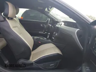 2017 Ford Mustang EcoBoost Premium z VIN 1FATP8UH5H5295852, wystawiony jako IAAI lot #41876517 z przebiegiem 132 910 mil mil oraz . Historia ofert i sprzedaży dostępna na DreamBid. Obrazek 5.