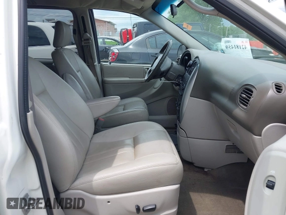 2007 Chrysler Town & Country Touring with VIN 2A4GP54L87R273936, listed as a IAAI auction lot 42181459 with 201,571 mi miles and . Bid and sale history available at DreamBid. Image 5.