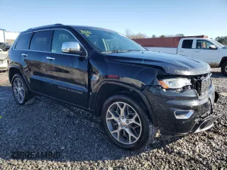 2020 Jeep Grand Cherokee Overland with VIN 1C4RJFCG2LC230688, listed as a Copart auction lot 86249654 with 67,882 mi miles and Salvage Title. Bid and sale history available at carsss.com. Image 4.