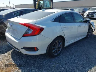 2020 Honda Civic EX-L with VIN 19XFC1F70LE203137, listed as a IAAI auction lot 42028424 with 87,011 mi miles and . Bid and sale history available at DreamBid. Image 4.
