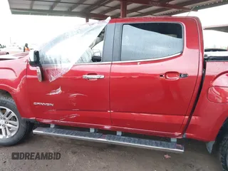 2015 GMC Canyon 2WD SLT with VIN 1GTG5CE39F1225427, listed as a IAAI auction lot 41453753 with 115,801 mi miles. Bid and sale history available at carsss.com. Image 13.