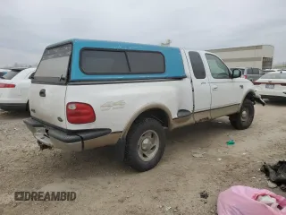 2000 Ford F-150 XL with VIN 2FTRX08L0YCA70958, listed as a Copart auction lot 44517605 with 237,228 mi miles and Salvage title. Bid and sale history available at DreamBid. Image 3.