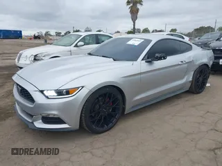 2015 Ford Mustang V6 with VIN 1FA6P8AM2F5370342, listed as a IAAI auction lot 42065605 with 141,569 mi miles and . Bid and sale history available at DreamBid. Image 2.