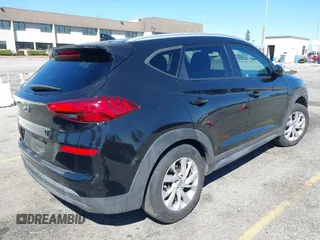 2021 Hyundai Tucson Value z VIN KM8J33A43MU306697, wystawiony jako IAAI lot #41869100 z przebiegiem 129 776 mil mil oraz . Historia ofert i sprzedaży dostępna na DreamBid. Obrazek 4.