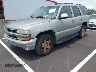 2004 Chevrolet Tahoe LS z VIN 1GNEC13Z84R140433, wystawiony jako IAAI lot #42352311 z przebiegiem Nie podano mil oraz . Historia ofert i sprzedaży dostępna na DreamBid. Obrazek 2.