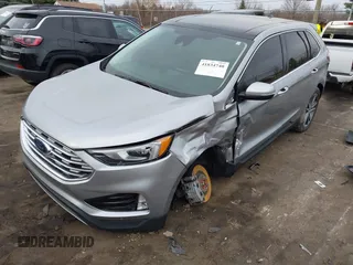 2021 Ford Edge Titanium z VIN 2FMPK4K94MBA32297, wystawiony jako IAAI lot #41834740 z przebiegiem 45 908 mil mil oraz . Historia ofert i sprzedaży dostępna na DreamBid. Obrazek 2.