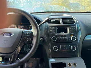2016 Ford Utility Police Interceptor with VIN 1FM5K8AR4GGA86535, listed as a Copart auction lot 82485664 with 125,876 mi miles and Clean Title. Bid and sale history available at carsss.com. Image 9.
