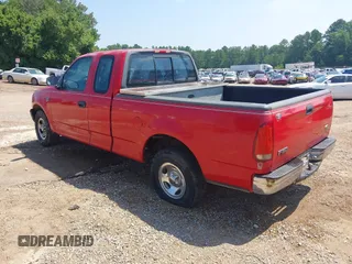 2000 Ford F-150 XL with VIN 1FTZX1724YNA42041, listed as a IAAI auction lot 42577102 with Not provided miles and . Bid and sale history available at DreamBid. Image 3.
