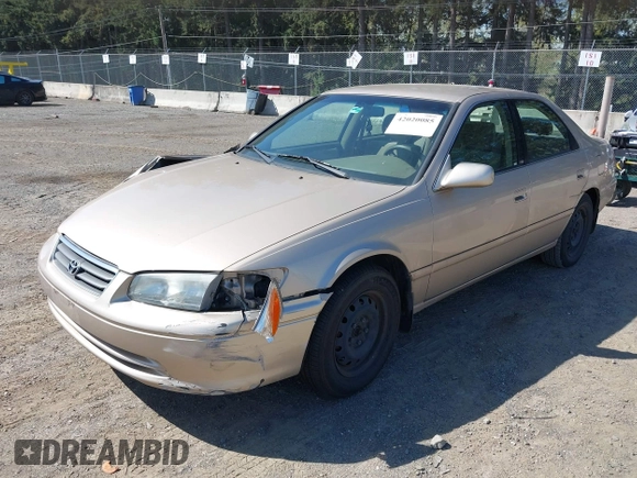2001 Toyota Camry CE with VIN JT2BG22K910581703, listed as a IAAI auction lot 42020085 with 107,035 mi miles. Bid and sale history available at carsss.com. Image 2.