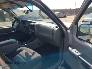 2003 Ford Explorer Sport Trac XLS с VIN 1FMDU77E73UC28215, выставлен на аукционе IAAI как лот 42582627 с пробегом 184 089 миль миль и . История ставок и продаж доступна на DreamBid. Изображение 5.