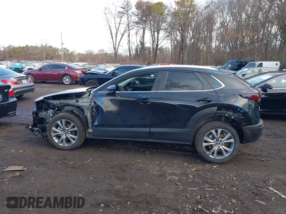 2024 Mazda CX-30 S Preferred z VIN 3MVDMBCM4RM681739, wystawiony jako IAAI lot #41788291 z przebiegiem 7 757 mil mil oraz . Historia ofert i sprzedaży dostępna na DreamBid. Obrazek 14.