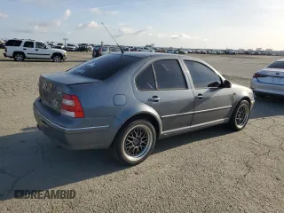 2004 Volkswagen Jetta GLS with VIN 3VWSE69M64M020143, listed as a Copart auction lot 52111795 with 175,088 mi miles and Salvage title. Bid and sale history available at DreamBid. Image 3.