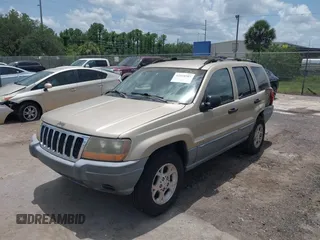 2001 Jeep Grand Cherokee Laredo с VIN 1J4GX48S31C564873, выставлен на аукционе IAAI как лот 42310387 с пробегом 137 581 миль миль и . История ставок и продаж доступна на DreamBid. Изображение 2.