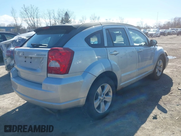 2011 Dodge Caliber Mainstreet with VIN 1B3CB3HA9BD295750, listed as a IAAI auction lot 42049996 with Not Provided miles. Bid and sale history available at carsss.com. Image 4.