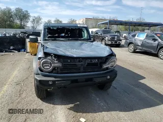 2023 Ford Bronco z VIN 1FMDE5AH6PLB63177, wystawiony jako Copart lot #52208625 z przebiegiem 10 865 mil mil oraz Szkoda całkowita • Salvage title. Historia ofert i sprzedaży dostępna na DreamBid. Obrazek 11.