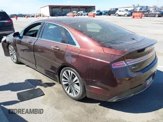 2019 Lincoln MKZ Reserve II z VIN 3LN6L5E99KR623668, wystawiony jako IAAI lot #41822730 z przebiegiem 13 609 mil mil oraz . Historia ofert i sprzedaży dostępna na DreamBid. Obrazek 3.