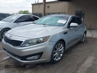 2013 Kia Optima LX with VIN 5XXGM4A70DG129754, listed as a IAAI auction lot 42061666 with 225,099 mi miles. Bid and sale history available at carsss.com. Image 2.