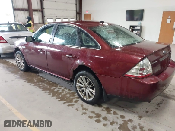 2008 Ford Taurus Limited with VIN 1FAHP28W28G153930, listed as a IAAI auction lot 42154827 with 243,386 mi miles. Bid and sale history available at carsss.com. Image 3.