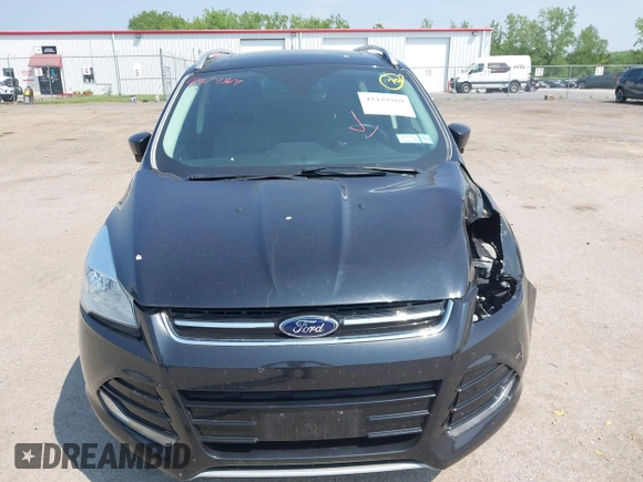 2015 Ford Escape Titanium with VIN 1FMCU9J96FUB58519, listed as a IAAI auction lot 42429369 with 125,541 mi miles and . Bid and sale history available at DreamBid. Image 12.