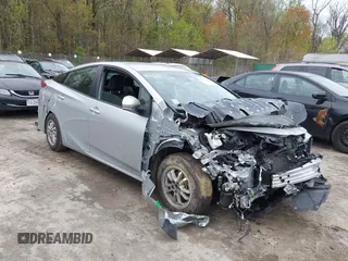 2021 Toyota Prius LE z VIN JTDKAMFP0M3194485, wystawiony jako IAAI lot #42019500 z przebiegiem 42 191 mil mil oraz . Historia ofert i sprzedaży dostępna na DreamBid. Obrazek 1.
