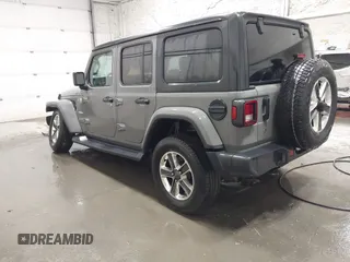 2019 Jeep Wrangler Unlimited Sahara with VIN 1C4HJXEG9KW656454, listed as a IAAI auction lot 41648236 with 75,403 mi miles and . Bid and sale history available at DreamBid. Image 3.
