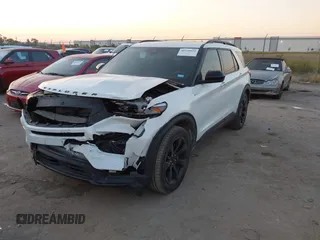 2023 Ford Explorer ST-Line with VIN 1FMSK7KH0PGA48562, listed as a IAAI auction lot 40530822 with 30,962 mi miles. Bid and sale history available at carsss.com. Image 2.