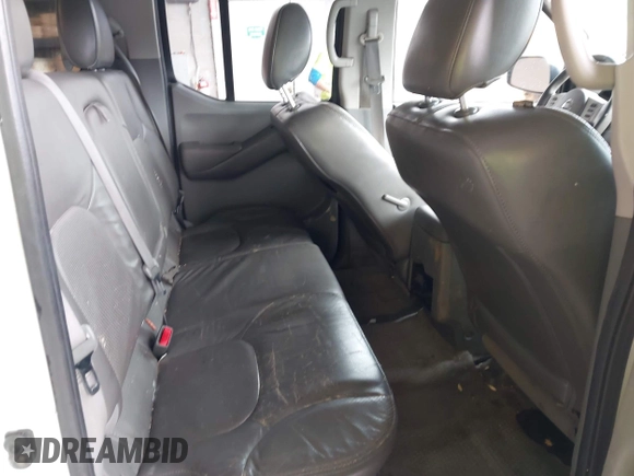 2011 Nissan Frontier Pro-4X with VIN 1N6AD0EV3BC409184, listed as a IAAI auction lot 42122823 with 209,669 mi miles and . Bid and sale history available at DreamBid. Image 8.