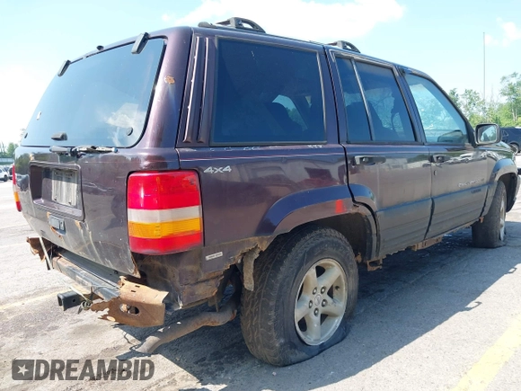 1997 Jeep Grand Cherokee Laredo with VIN 1J4GZ58S0VC708420, listed as a IAAI auction lot 42624603 with Not provided miles and . Bid and sale history available at DreamBid. Image 11.