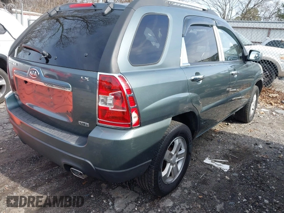 2009 Kia Sportage LX with VIN KNDJE723197563651, listed as a IAAI auction lot 41477610 with 168,797 mi miles and . Bid and sale history available at carsss.com. Image 4.