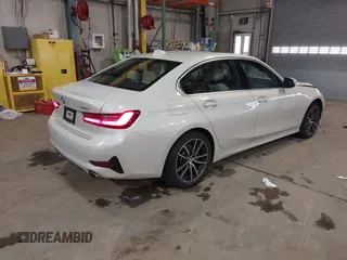 2021 BMW 3 Series 330i xDrive with VIN 3MW5R7J01M8C07735, listed as a IAAI auction lot 41570956 with 70,915 mi miles and . Bid and sale history available at carsss.com. Image 4.