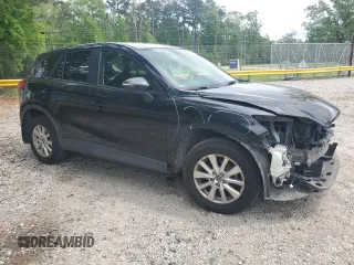 2016 Mazda CX-5 Touring with VIN JM3KE2CY9G0661308, listed as a Copart auction lot 51853485 with 131,595 mi miles and Salvage Title. Bid and sale history available at carsss.com. Image 4.