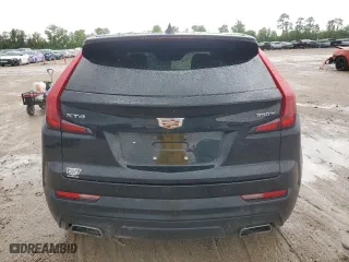 2023 Cadillac XT4 FWD Luxury with VIN 1GYAZAR45PF218684, listed as a Copart auction lot 54427565 with 74,920 mi miles and Salvage Title. Bid and sale history available at carsss.com. Image 6.
