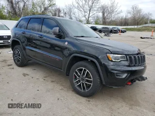 2021 Jeep Grand Cherokee Trailhawk with VIN 1C4RJFLG7MC599693, listed as a Copart auction lot 52863525 with 95,289 mi miles and Salvage Title. Bid and sale history available at carsss.com. Image 4.