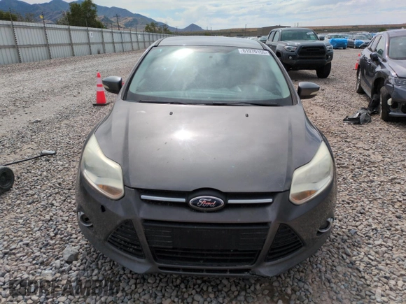2013 Ford Focus SE with VIN 1FADP3F24DL189897, listed as a Copart auction lot 61970155 with 212,218 mi miles and Salvage title. Bid and sale history available at DreamBid. Image 5.