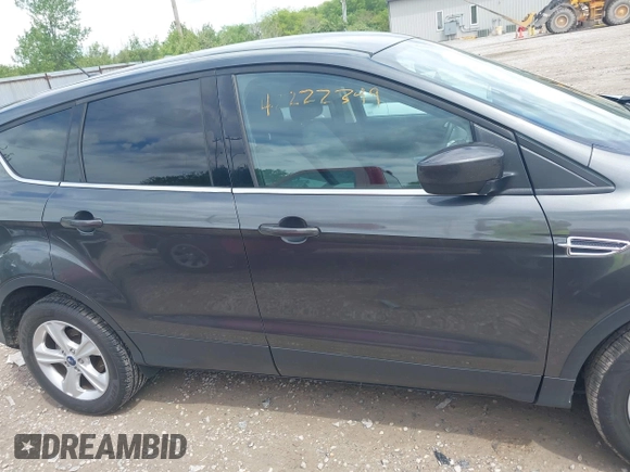 2016 Ford Escape SE with VIN 1FMCU9GXXGUC81604, listed as a IAAI auction lot 42222349 with 106,188 mi miles and . Bid and sale history available at DreamBid. Image 13.