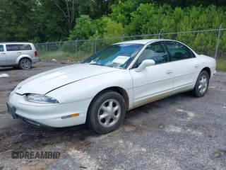 1995 Oldsmobile Aurora z VIN 1G3GR62C8S4147628, wystawiony jako IAAI lot #42361531 z przebiegiem 189 111 mil mil oraz . Historia ofert i sprzedaży dostępna na DreamBid. Obrazek 2.