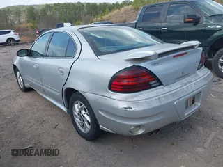 2004 Pontiac Grand Am SE1 with VIN 1G2NF52E34C257673, listed as a IAAI auction lot 41785458 with 157,473 mi miles. Bid and sale history available at carsss.com. Image 3.