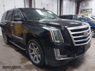 2016 Cadillac Escalade Premium Collection with VIN 1GYS4CKJ6GR410869, listed as a IAAI auction lot 41414350 with 134,677 mi miles. Bid and sale history available at carsss.com. Image 1.