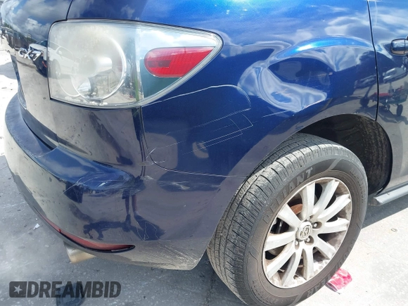 2010 Mazda CX-7 Sport with VIN JM3ER2W5XA0301457, listed as a IAAI auction lot 42257772 with 229,697 mi miles and . Bid and sale history available at DreamBid. Image 12.