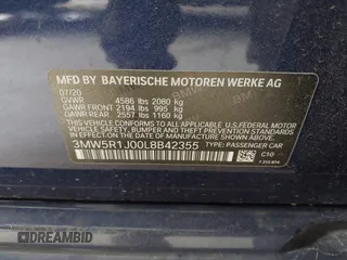 2020 BMW 3 Series 330i with VIN 3MW5R1J00L8B42355, listed as a IAAI auction lot 41817750 with 52,069 mi miles. Bid and sale history available at carsss.com. Image 9.