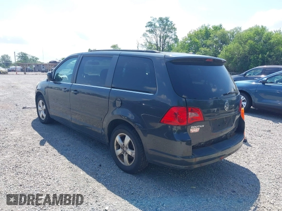 2011 Volkswagen Routan SE with VIN 2V4RW3DGXBR669762, listed as a IAAI auction lot 42693493 with 105,415 mi miles and . Bid and sale history available at DreamBid. Image 3.