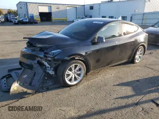 2022 Tesla Model Y Long Range with VIN 7SAYGAEE1NF562042, listed as a Copart auction lot 45702845 with 34,240 mi miles and Salvage Title. Bid and sale history available at carsss.com. Image 1.