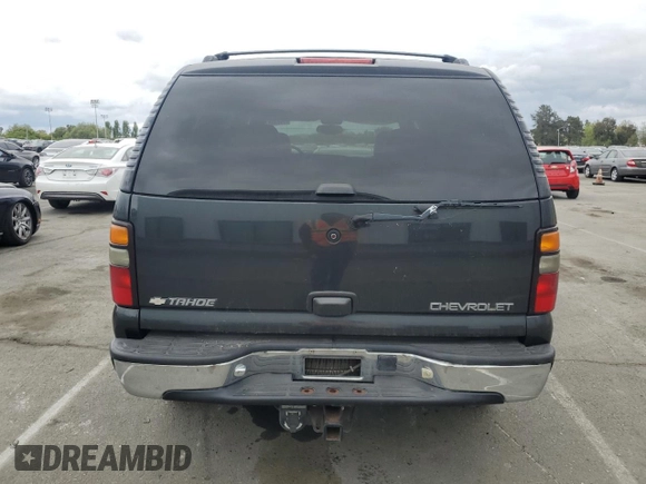 2005 Chevrolet Tahoe Z71 with VIN 1GNEC13T85R141076, listed as a Copart auction lot 54733415 with 310,992 mi miles and Salvage title. Bid and sale history available at DreamBid. Image 6.