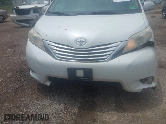 2014 Toyota Sienna XLE with VIN 5TDYK3DC2ES517663, listed as a IAAI auction lot 42171862 with 143,447 mi miles and . Bid and sale history available at DreamBid. Image 6.