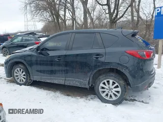2014 Mazda CX-5 Touring with VIN JM3KE4CY8E0416590, listed as a IAAI auction lot 41619713 with 225,156 mi miles. Bid and sale history available at carsss.com. Image 15.