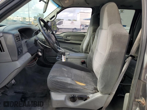 2002 Ford F-250 XL with VIN 1FTNW20F12EB93947, listed as a Copart auction lot 77836054 with 322,030 mi miles and Salvage Title. Bid and sale history available at DreamBid. Image 7.