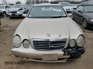 2002 Mercedes-Benz E-Class with VIN WDBJF82J52X062915, listed as a Copart auction lot 48284604 with 150,227 mi miles and Salvage Title. Bid and sale history available at carsss.com. Image 5.