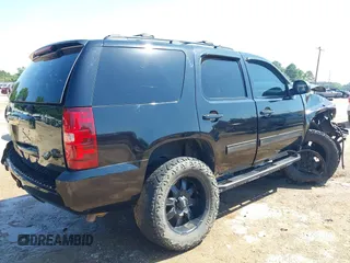2013 Chevrolet Tahoe LS with VIN 1GNSCAE06DR263469, listed as a IAAI auction lot 42245636 with 240,506 mi miles and . Bid and sale history available at DreamBid. Image 4.