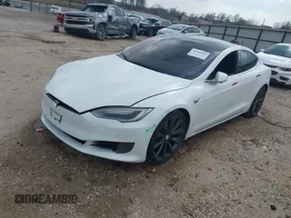 2017 Tesla Model S 100D z VIN 5YJSA1E29HF204797, wystawiony jako IAAI lot #41760296 z przebiegiem 92 587 mil mil oraz . Historia ofert i sprzedaży dostępna na DreamBid. Obrazek 19.